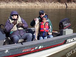 Little boy showing off his catch 